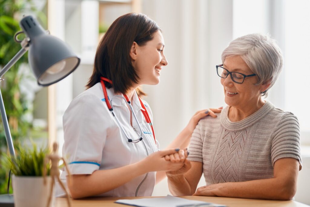 Physician supporting an adult patient during a primary care visit